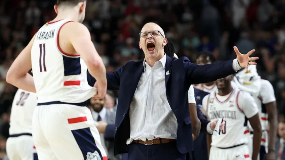 Uconn%E2%80%99s+head+coach%2C+Dan+Hurley%2C+celebrates+with+his+team+during+the+final+seconds+of+the+2024+National+Championship+game.+